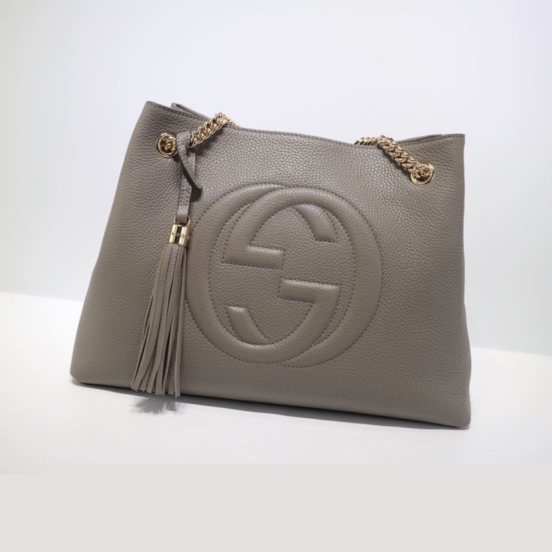 G*u*i shopping bags